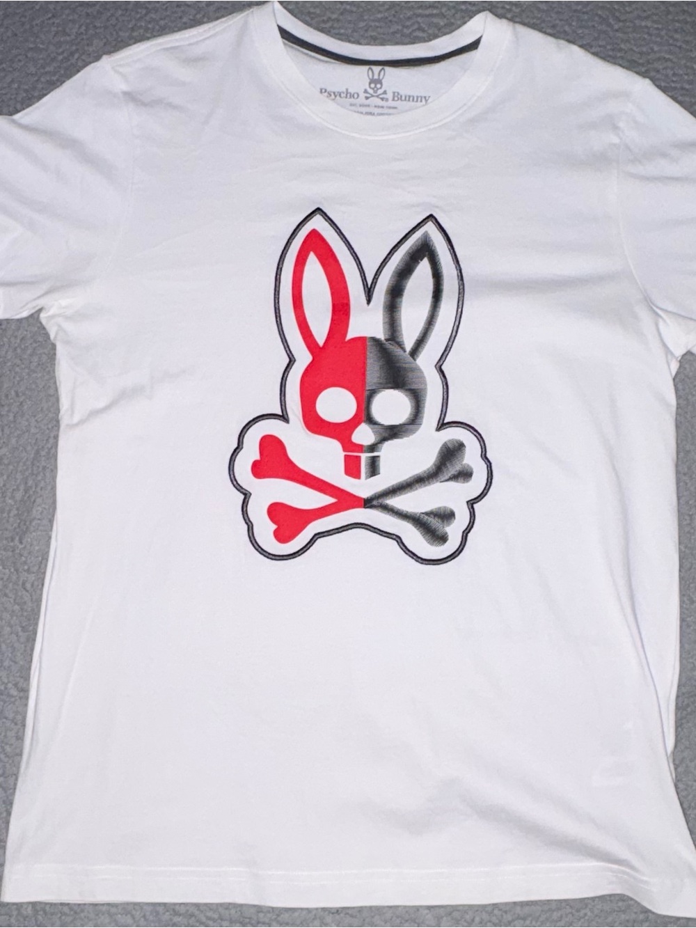 Psycho Bunny White Tee with Red & Black Split Bunny Skull Graphic